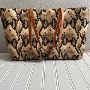 Consuela, big breezy East/West side Morgot snakeskin